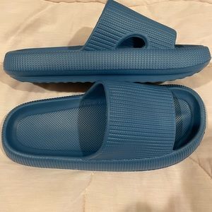 Cloudies slides. Never worn outside!!